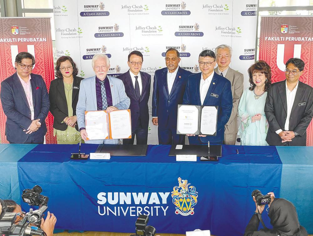 Cheah (fourth from left) flanked by Poppema and Zambry and accompanied by Mohd Ekhwan (sixth from left) during the inauguration event at Sunway University in Bandar Sunway. – Adib Rawi Yahya/theSun