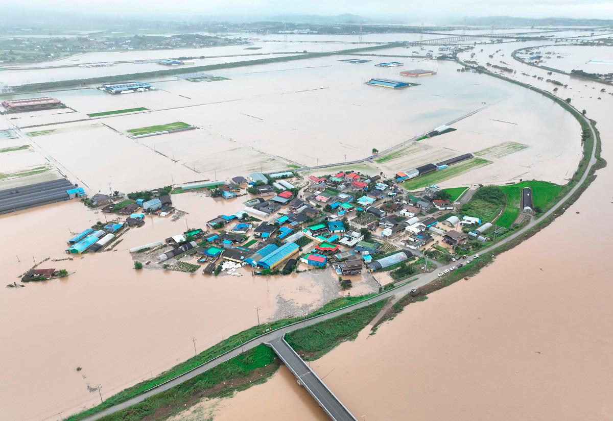 An aerial view of flooding caused by torrential rain in Yesan, South Korea, July 17, 2025. Yonhap via REUTERS PIX