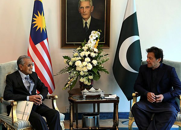 Prime Minister Tun Dr Mahathir Mohamad attends a meeting with Pakistan Prime Minister Imran Khan at the Pakistan Prime Minister’s House in Islamabad on March 22, 2019. — Bernama