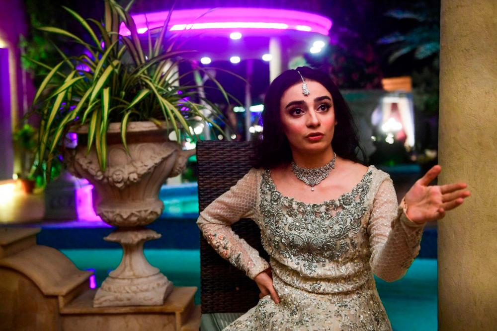In this picture taken on October 15, 2020 actress Mehar Bano, one of the casts of the drama serial “Churails”, or “Witches” speaks during an interview with AFP in Karachi. AFP / Asif HASSAN