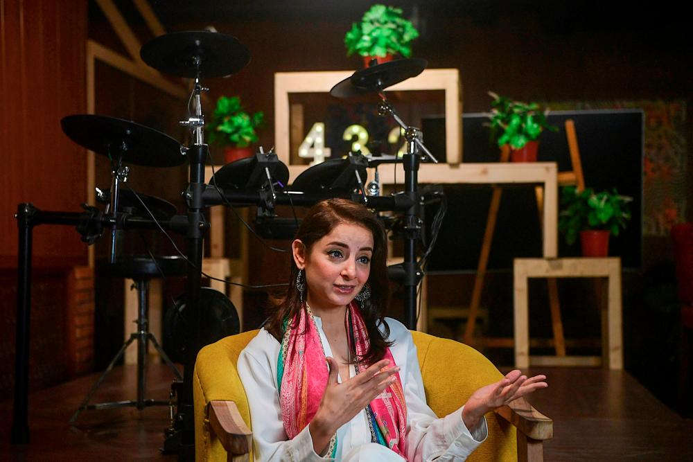 $!In this picture taken on October 16, 2020 actress Sarwat Gilani, one of the casts of the drama serial “Churails”, or “Witches” speaks during an interview with AFP in Karachi. AFP / Asif HASSAN