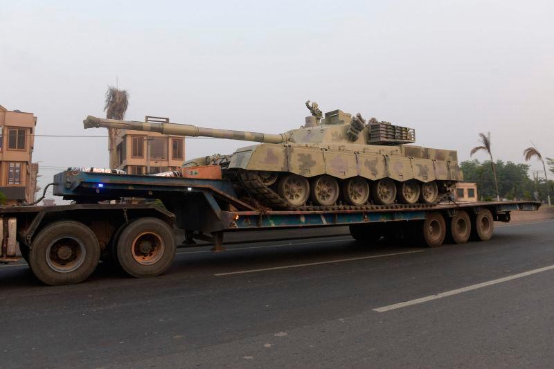 A truck transports an army tank on a road in Muridke, about 30 kilometres from Lahore, on May 7, 2025. AFPpix
