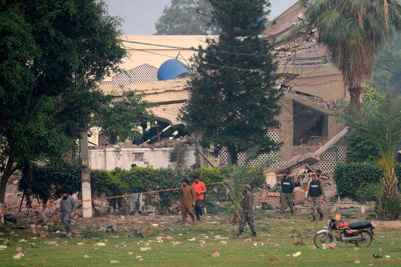 Paramilitary soldiers inspect a collapsed building of the Government Health and Educational complex after Indian strikes in Muridke, about 30 kilometres from Lahore, on May 7, 2025. AFPpix