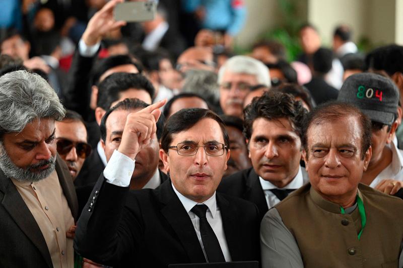 Gohar Ali Khan (C), chairman of former prime minister Imran Khan's Pakistan Tehreek-e-Insaaf (PTI) party, addresses media members after a Supreme Court's verdict in Islamabad on July 12, 2024. Pakistan's Supreme Court on July 12 granted jailed former prime minister Imran Khan's party around 20 seats in parliament reserved for women and minorities, months after national elections marred by allegations of pre-poll rigging. - AFPpix