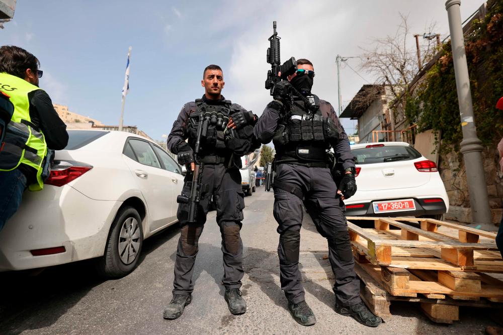 Israeli security forces stand guard in Jerusalem’s predominantly Arab neighbourhood of Silwan, where an assailant reportedly shot and wounded two people, on January 28, 2023. AFPPIX