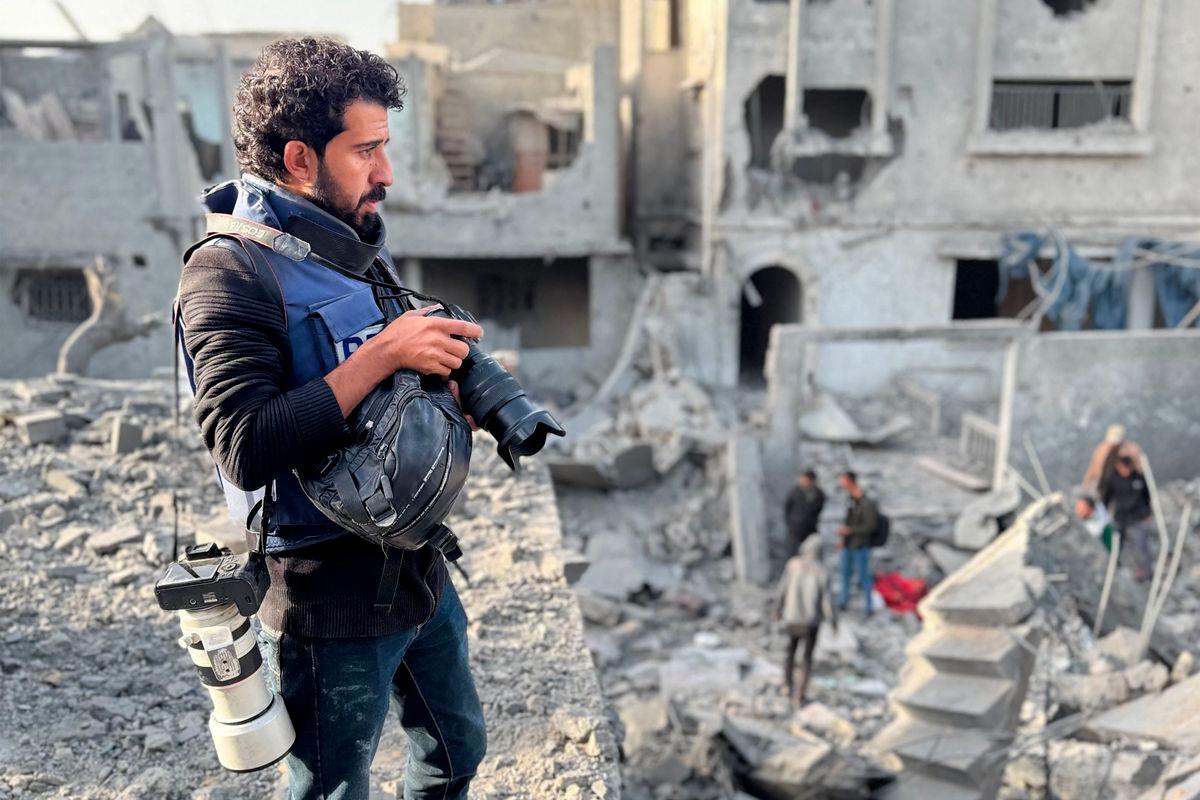 AFP journalist Omar Al-Qattaa poses for a picture in the Gaza Strip on December 26, 2024. - AFPPIX