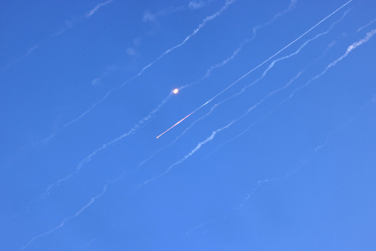 Missiles fired from Iran are pictured over Hebron in the occupied West Bank on June 19, 2025. Israel’s foreign ministry reported a direct hit on a hospital in the south on June 19, after Iran fired a fresh salvo of missiles at the country. - AFP