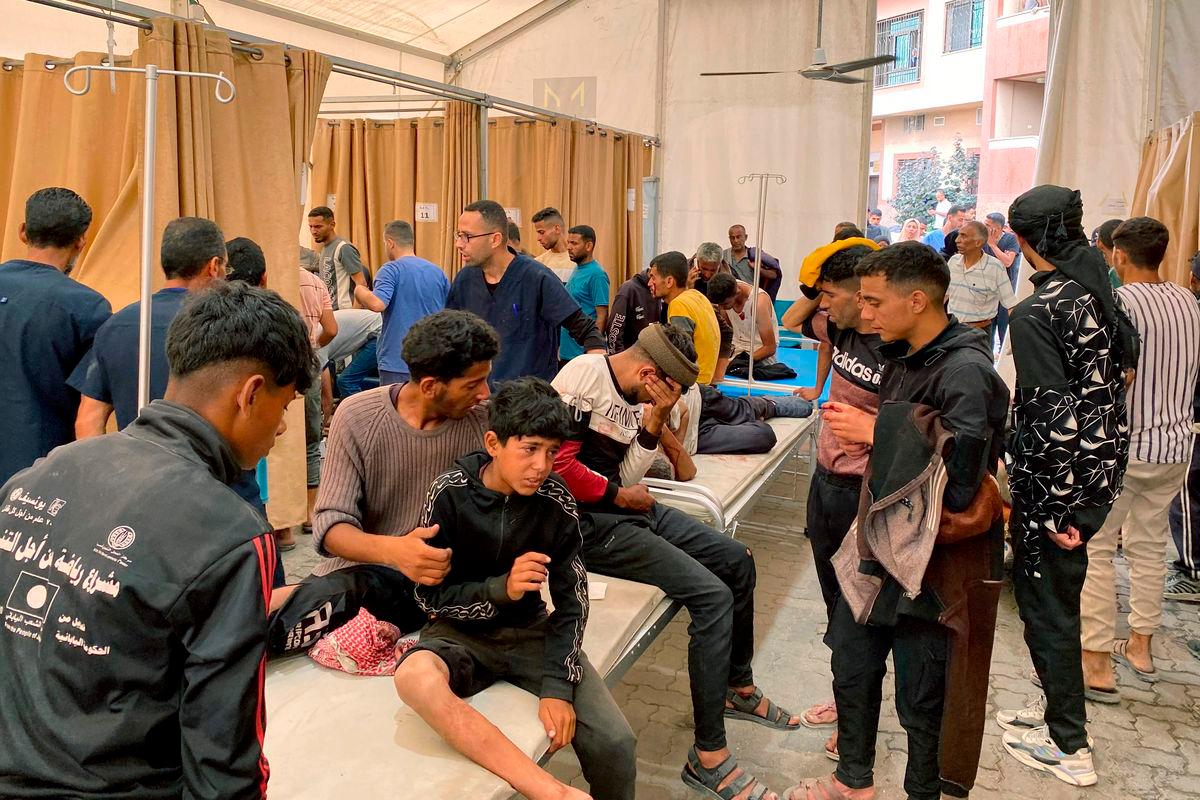 Palestinians who were injured in Israeli fire as they gathered near a food aid centre, receive care at Khan Yunis’ Nasser hospital in the southern Gaza Strip on June 17, 2025. (Photo by AFP)