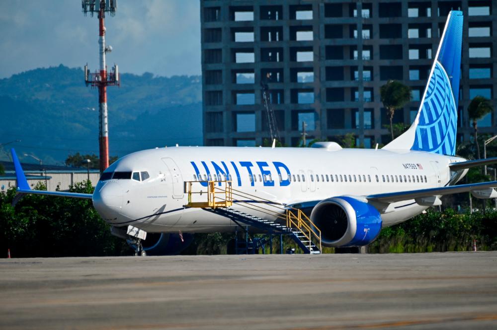 A United Airlines Boeing 737 MAX 9 jetliner grounded for safety checks. United Airlines says it has found loose bolts on multiple 737 MAX 9 aircraft. – Reuterspic