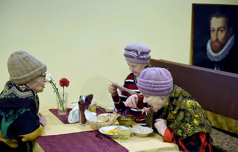 Pensioners enjoy free mid-day meal at the Dobrodomik cafe (which translates as ‘the good little house’) in Saint Petersburg on Feb 11, 2019. — AFP