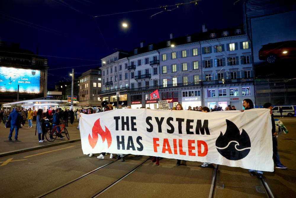 A group demonstrating in Zurich on Monday, March 20 2023, against the takeover of Credit Suisse by UBS. – Reuterspic