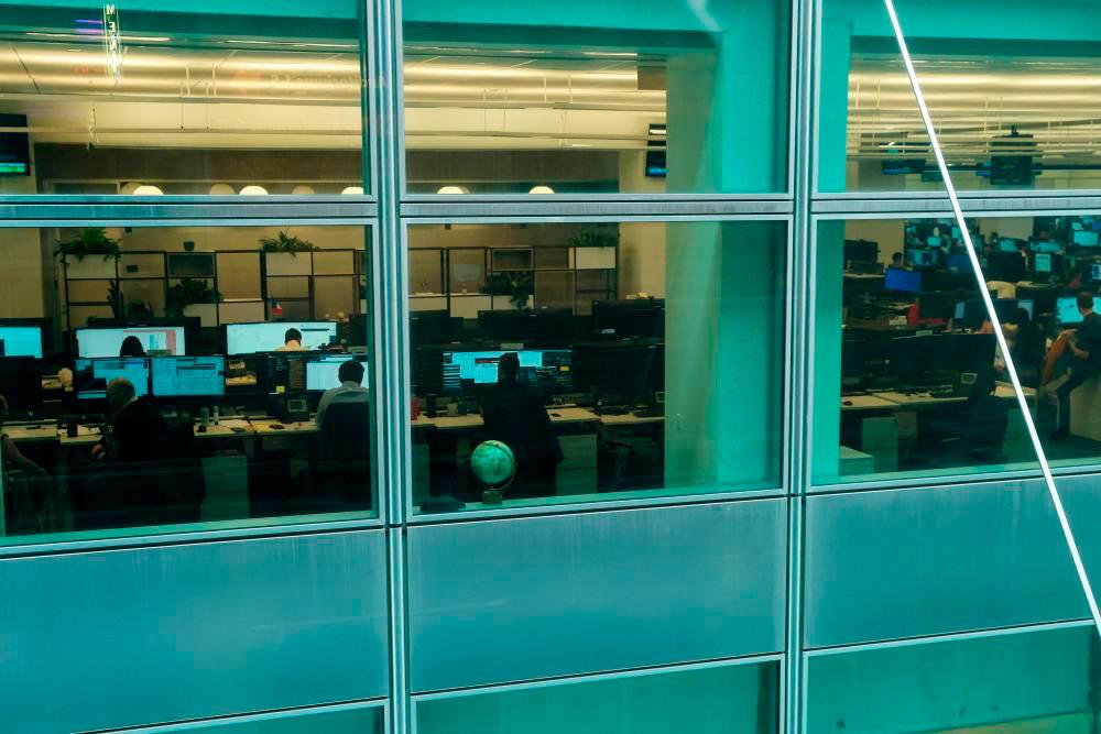 Employees working on the trading floor at the global headquarters of Goldman Sachs investment banking firm at 200 West Street in New York on Wednesday, Jan 11, REUTERSpix
