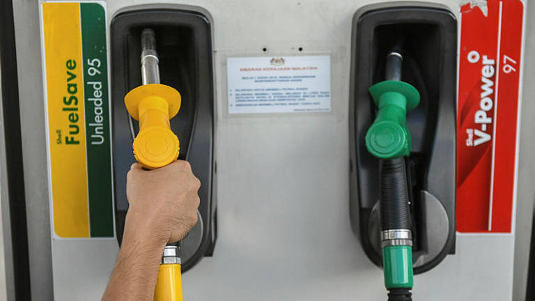 Fuel prices: RON97 down 2 sen, RON95, diesel unchanged