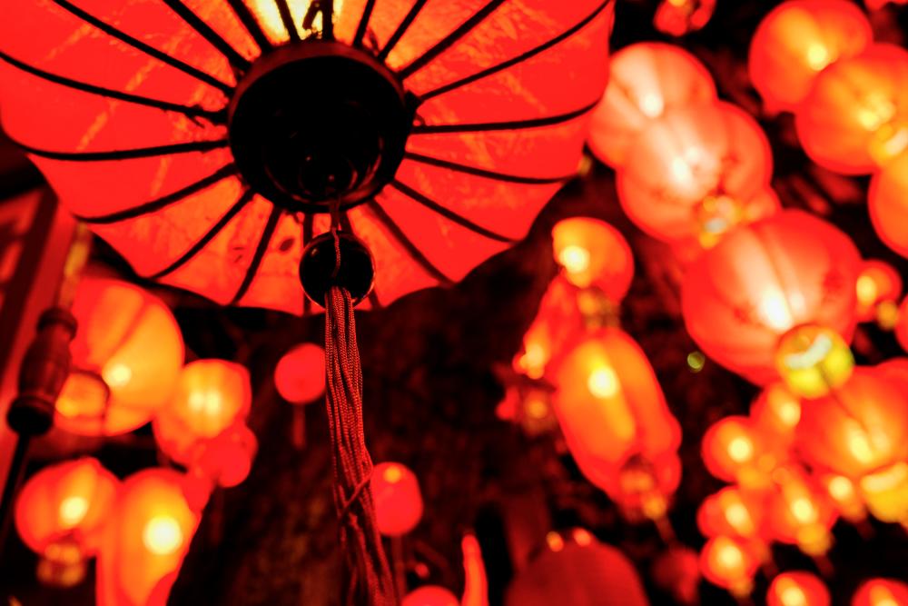 Bright red lanterns light the way for happiness and good luck.