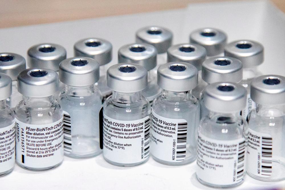 File photo: Empty vials of the Pfizer-BioNTech coronavirus disease (Covid-19) vaccine are seen at The Michener Institute, in Toronto, Canada January 4, 2021 in this file photo. REUTERSpix