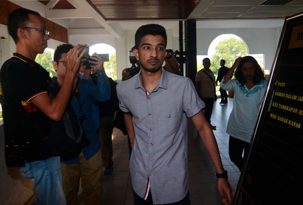 Former salon worker K. Vaitheswaran leaves the Bukit Mertajam magistrate’s court today after the court fixed June 28 for mention of his case. - Bernama