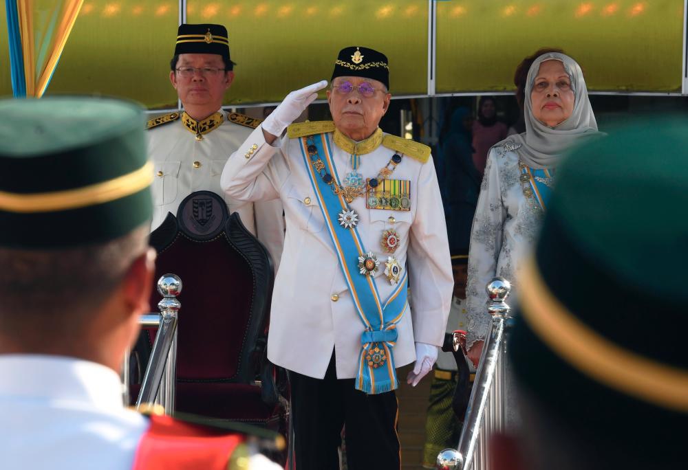 Penang Yang Dipertua Negeri Tun Abdul Rahman Abbas salutes the honour guard at the State Investiture Ceremony in conjunction with his 81st birthday anniversary at the Dewan Sri Pinang today. - Bernama