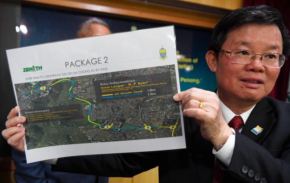 Penang Chief Minister Chow Kon Yeow announces plans to construct the bypass from Ayer Itam to LCE Expressway at the Package 2 Sub-Agreement signing ceremony between the Penang state government and Consortium Zenith Construction Sdn Bhd in George Town. - Bernama