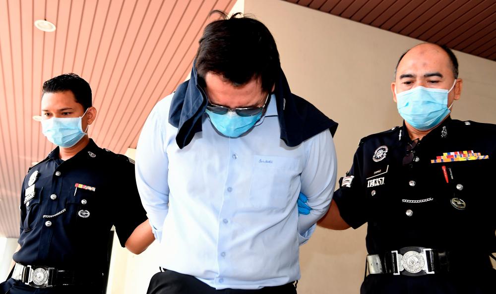Doctor Dr Neoh Soon Khai, 39, was charged in the George Town magistrates’ court today for dishonestly retaining stolen property. - Bernama