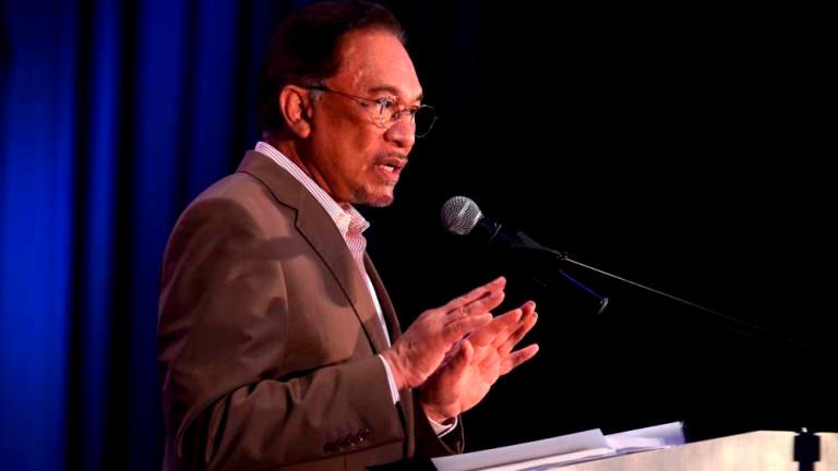 Anwar sued by ex-research assistant for sexual assault