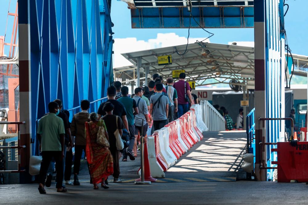 BUTTERWORTH, July 12 -- Ferry service users entered the Sultan Abdul Halim Base Terminal area to go to George Town yesterday. BERNAMAPIX