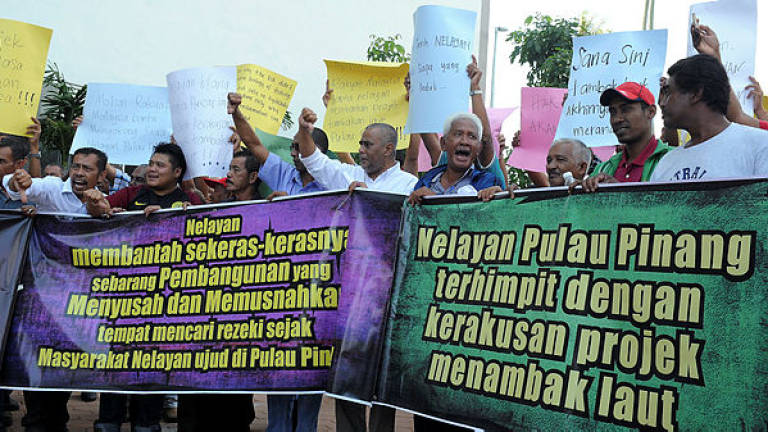 Filepix taken on Dec 17, 2018 shows a group of fishermen protesting against the Penang South Reclamation (PSR) — Bernama