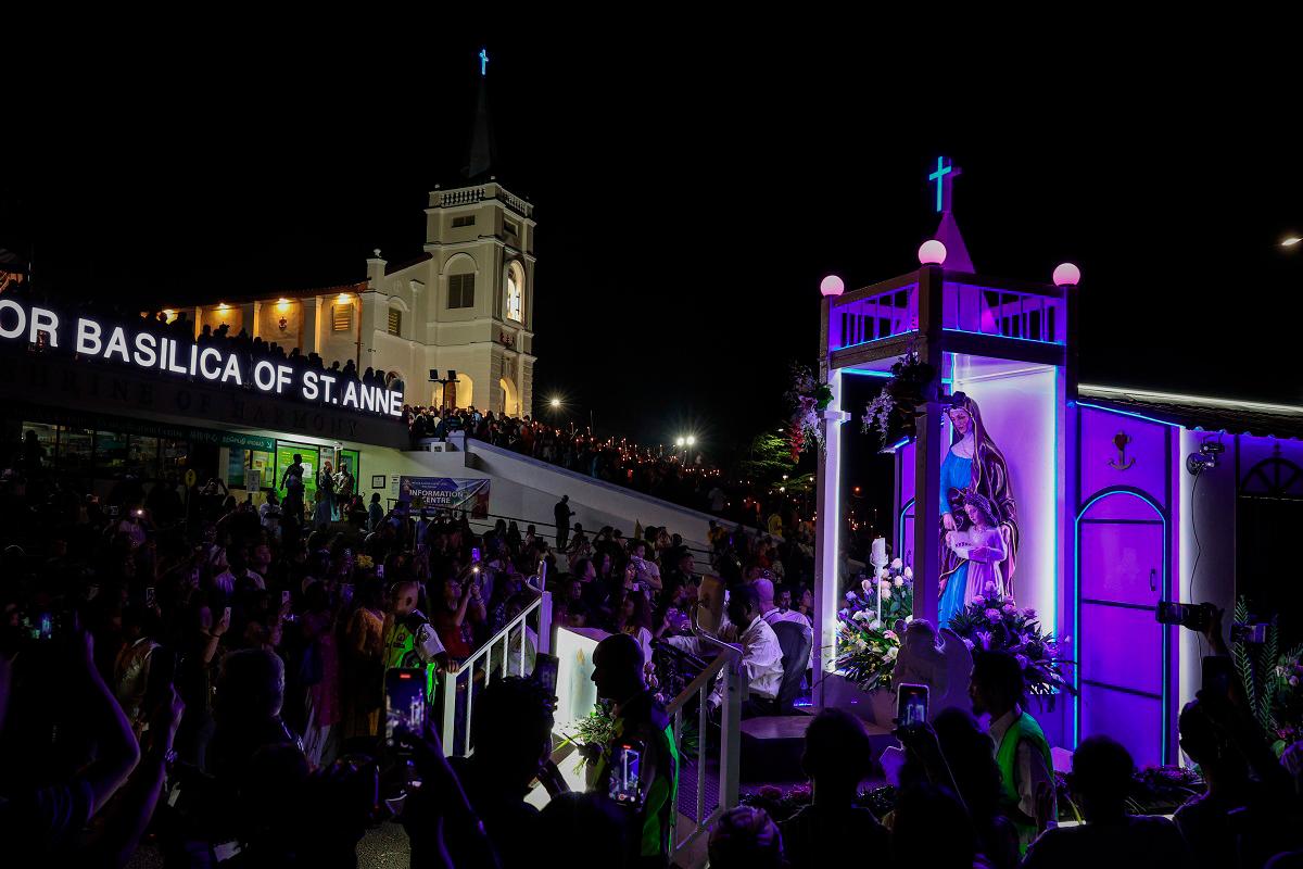 Catholics attend St Anne’s Church in Bukit Mertajam carrying candles as they attended the St Anne’s celebration last night. - Bernama