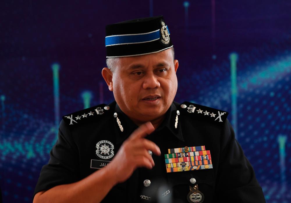 Pahang police chief Datuk Abdul Jalil Hassan answers questions at a press conference after Pahang police contingent’s medal award ceremony held in Kuantan today. - Bernama