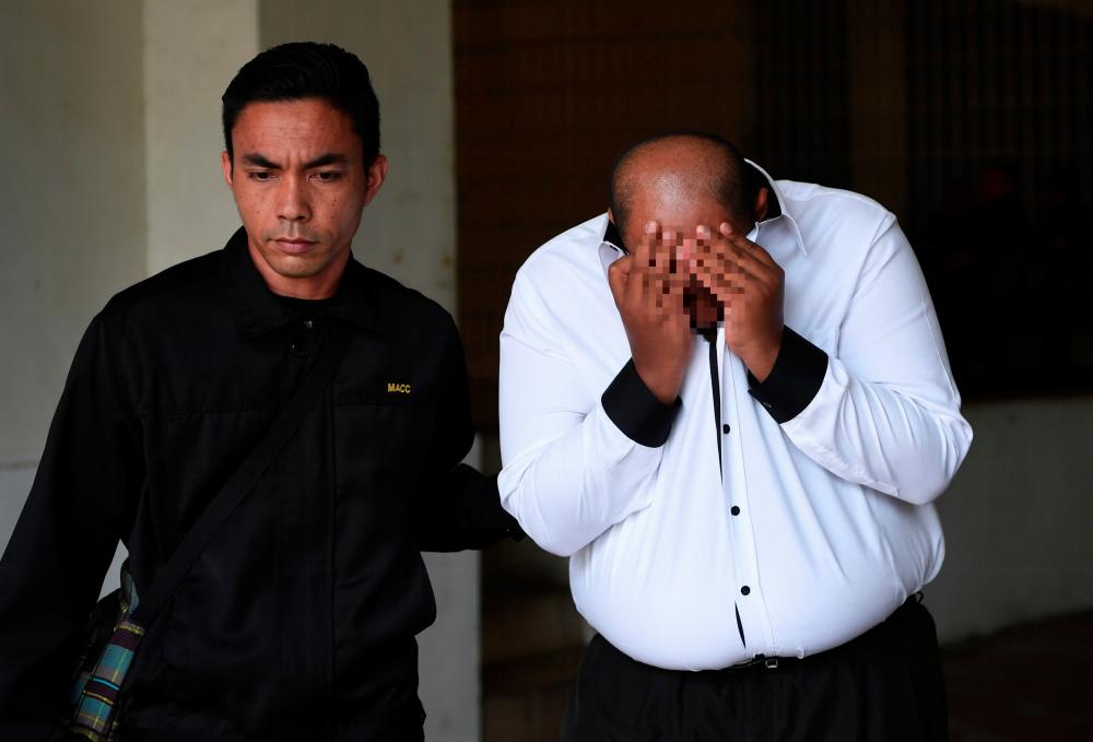 A magistrate has been remanded for five days from today to facilitate investigations into a case of accepting a bribe in return for not imposing a prison sentence on a suspected cigarette smuggler on Oct 23, 2019. — Bernama