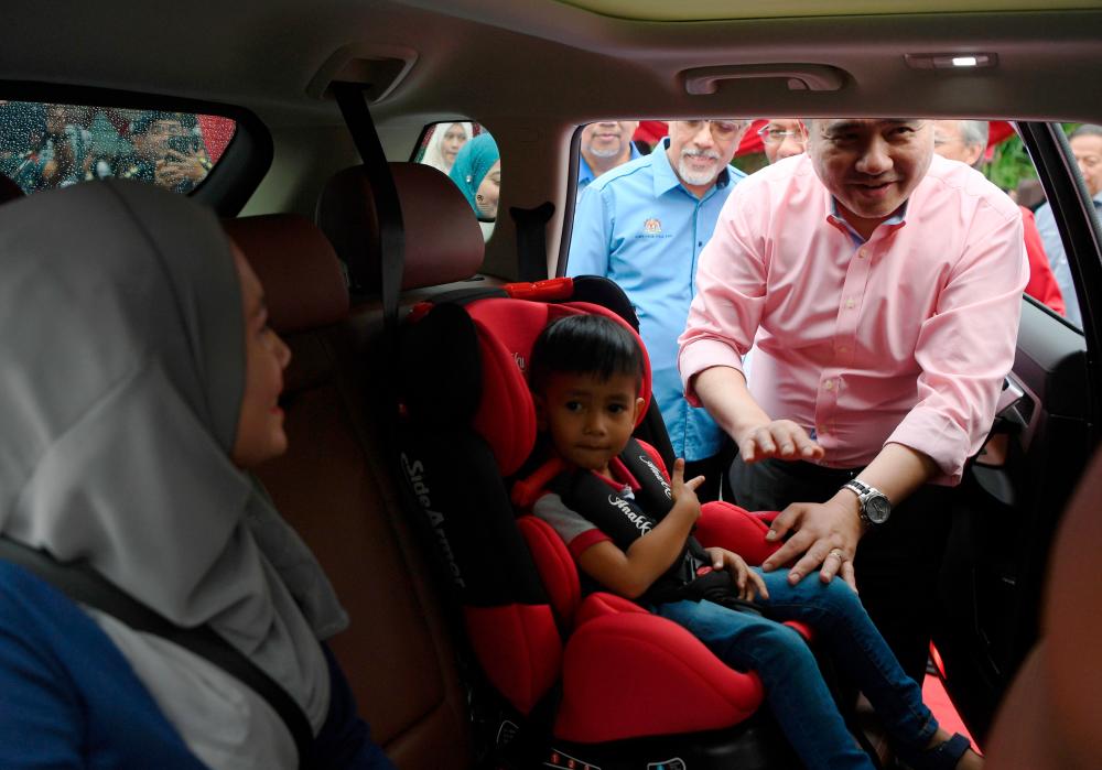 Transport Minister Anthony Loke Siew Fook mingles with road users using the CRS when opening the East Coast Highway (LPT) Road Safety and Chinese New Year Celebration at the West-bound Bentong R&amp;R on Jan 21, 2020. - Bernama