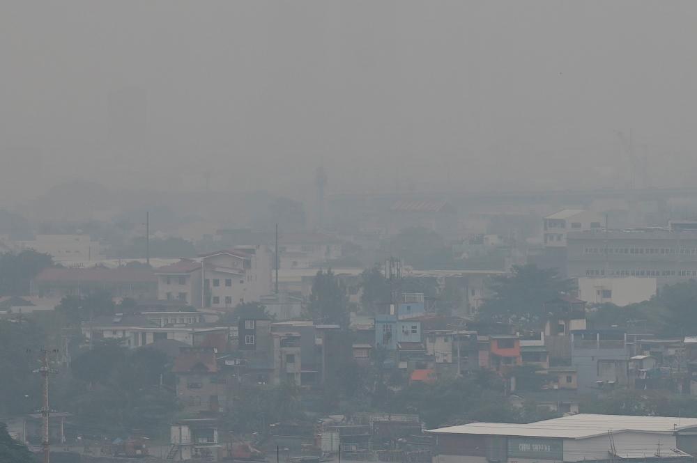 The Manila skyline is seen shrouded in smog on September 22, 2023/AFPPix