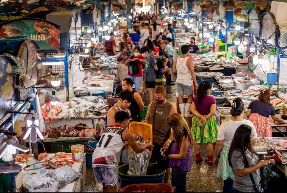 Vendors work at a public market in Quezon City, Philippines, August 9, 2022. REUTERSPIX