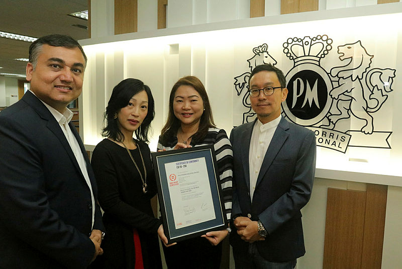 From left: Chinmay Sharma, Director People &amp; Culture, Amba Chan, Director of Finance, Veronica Choo, Head of Corporate Communications and Kang Tae Koo, Managing Director, Philip Morris (Malaysia) Sdn Bhd displaying the Equal-Salary certificate.