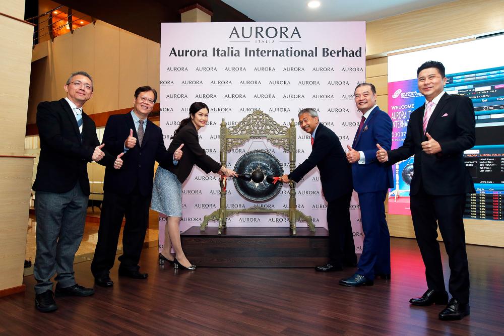 From left: M&amp;A Securities Sdn Bhd head of corporate finance Gary Ting, Aurora Italia director Lim Say Leong, Yvonne, Aurora Italia chairman Mirzan Mahathir, director Datuk Wira Louis Ng Chun Hau, and M&amp;A Securities managing director of corporate finance Datuk Bill Tan.