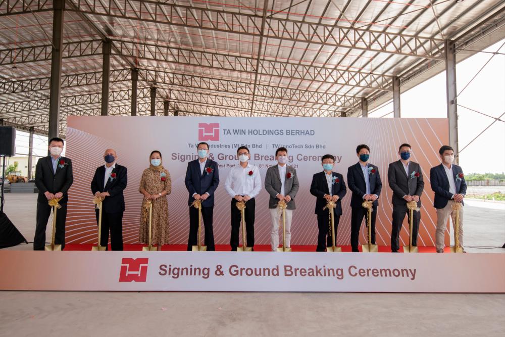 Ngu (sixth from left) at the ground-breaking ceremony marking Ta Win’s new factory in Port Klang.