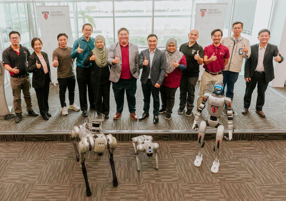 Industry partners, Advance Retro Solution (ARS) Sdn Bhd first from left, Alphaswift Industries Sdn Bhd third from left, Controller Area Network Solutions Malaysia Sdn Bhd first from right, and Hirose Electric Malaysia Sdn Bhd second from right, together with Mechatronics programme academics commemorate the launch in a group photo.