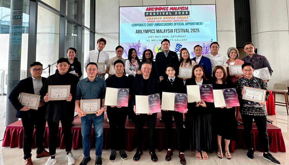 (Top row) Win Lee (4th from left) with Khatijah (5th from left) and Goh (6th from left) during the press launch of the Abilympics Malaysia Festival 2024/25 at the KL Wellness City Gallery .