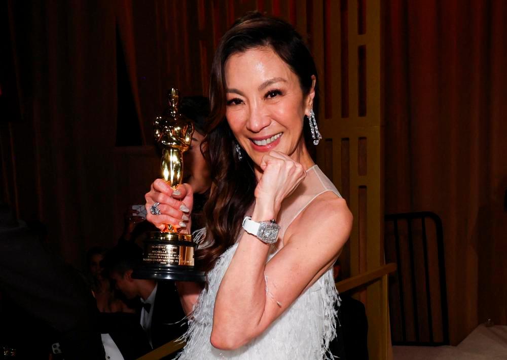 Best Actress Michelle Yeoh poses after having her Oscar engraved at the Governors Ball following the Oscars show at the 95th Academy Awards in Hollywood, Los Angeles, California, U.S., March 12, 2023/REUTERSPix