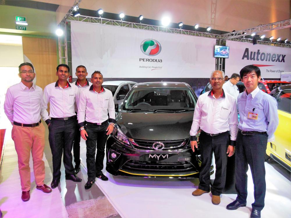 From left: Perodua Sales Sdn Bhd export planning &amp; development assistant manager Tengku Izuddin Tengku Najmuddin, Raouf Dusmohamud &amp; Co Ltd executive directors Ally Dusmohamud, Ziyaad Dusmohamud and Raid Dusmohamud, and Raouf Dusmohamud.