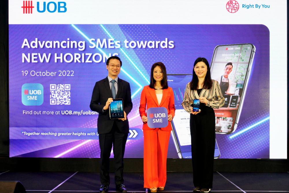 From left: Cheah, Ng and UOB Malaysia executive director and country head of business banking Ho Hui Ming at the launch of the UOB SME app.