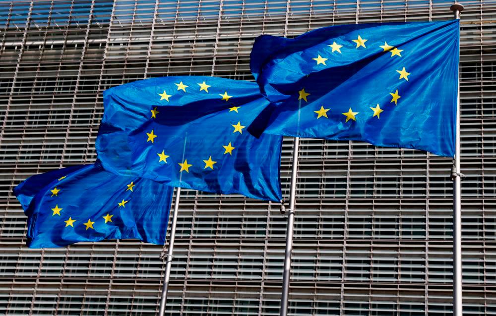 European Union flags fluttering outside the EU Commission headquarters in Brussels, Belgium. REUTERSpix