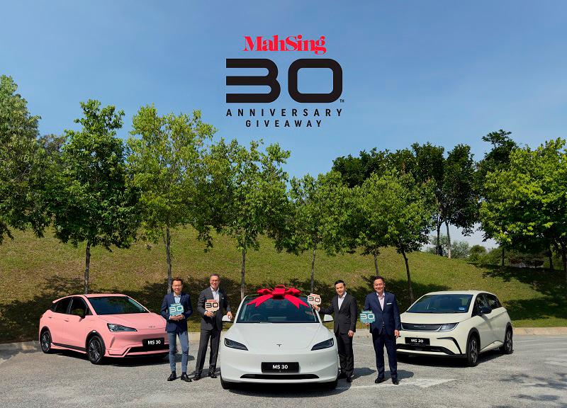 $!(From left): Mah Sing Group Berhad chief operating officer Chris Chen Weng Hong, CEO of property subsidiaries Benjamin Ong, group CEO and executive director DatukVoon Tin Yow and CEO of property subsidiaries Yeoh Chee Beng, with the three EVs to be given away in the group’s 30th anniversary campaign.