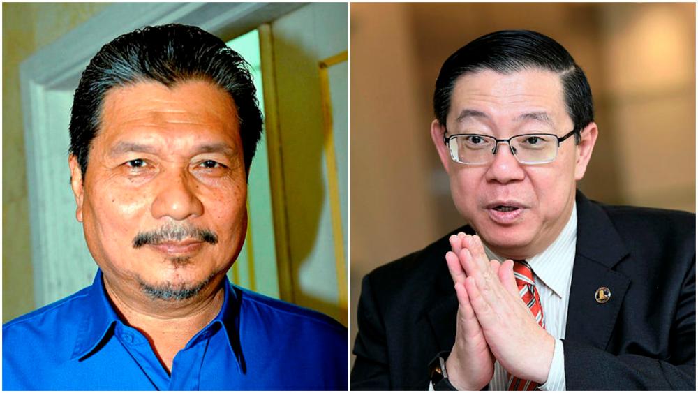 Datuk Idris Buang (L) and Lim Guan Eng.