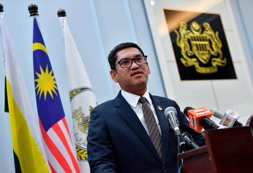 Perak Mentri Besar Datuk Seri Ahmad Faizal Azumu talks during a press conference after announcing the portfolios of seven new state executive council members today. — Bernama