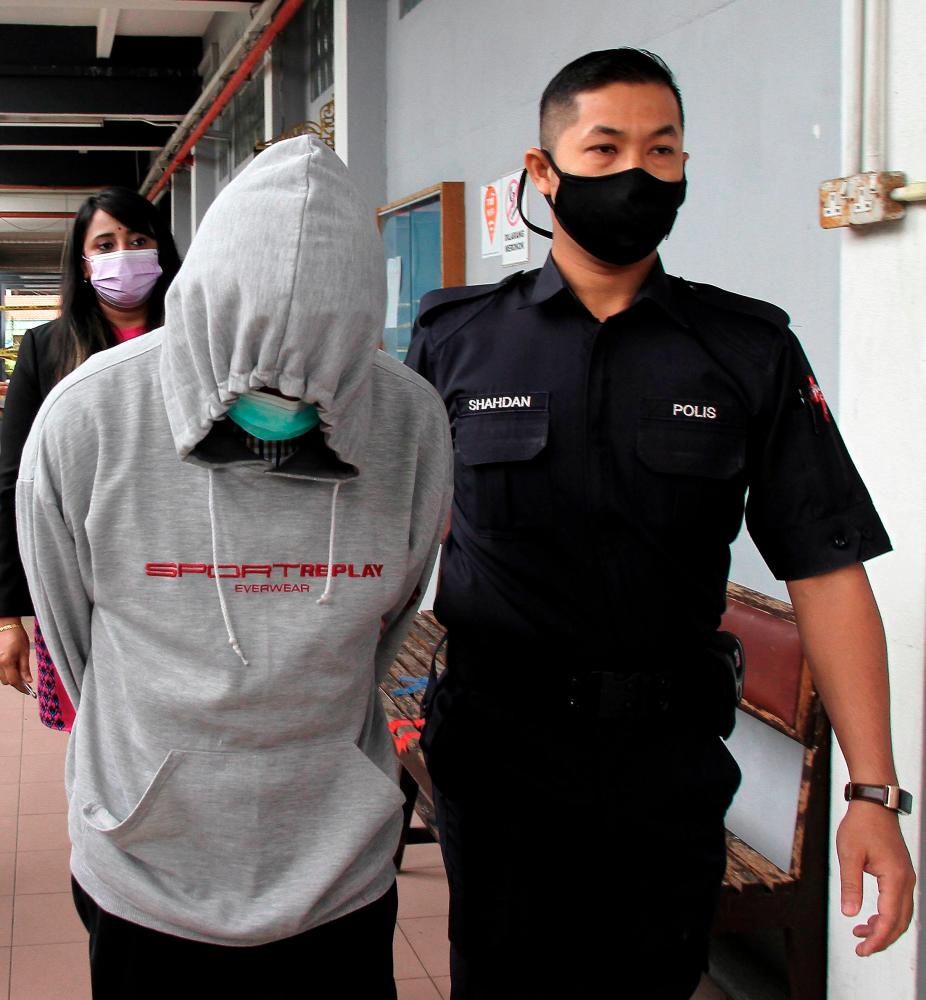 An attendant at a government clinic pleaded not guilty in the Sessions Court today, to two charges of committing physical sexual assault on his two daughters at Sitiawan, April 2020. Judge Mohd Fauzi Mohd Nasir allowed him bail of RM6,000 with one surety for both charges and also ordered to report himself at the nearest police station every first week of the month, as well as warned against communicating with the victims. The court set Feb 25 for mention. --fotoBERNAMA (2021) COPYRIGHT RESERVED