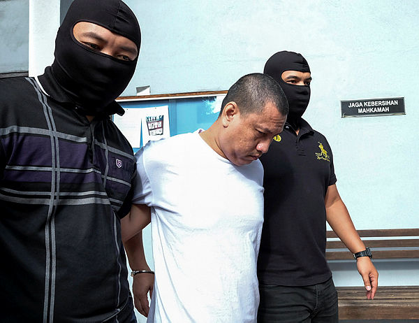 Hafiz Othman, a restaurant worker was charged in the Ipoh Sessions Court today with possession of terrorism-related publications.