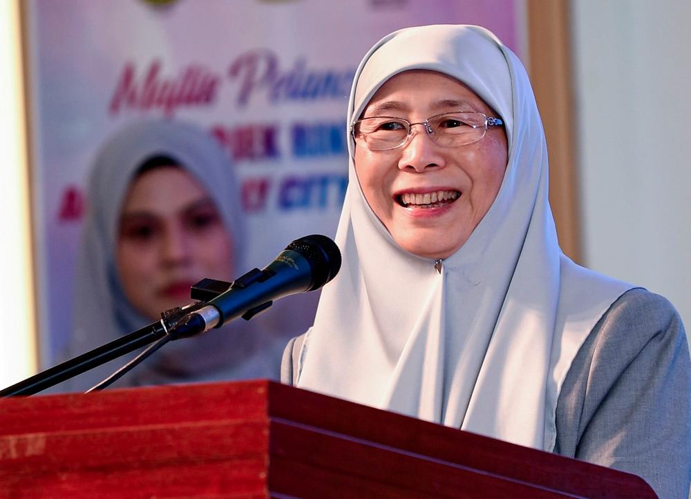 Deputy Prime Minister and Minister for Women, Family and Community Development Datuk Seri Dr Wan Azizah Wan Ismail speaking at the Launching Ceremony of Age-Friendly City@Taiping Pilot Project at a hotel on Oct 30, 2019. — Bernama