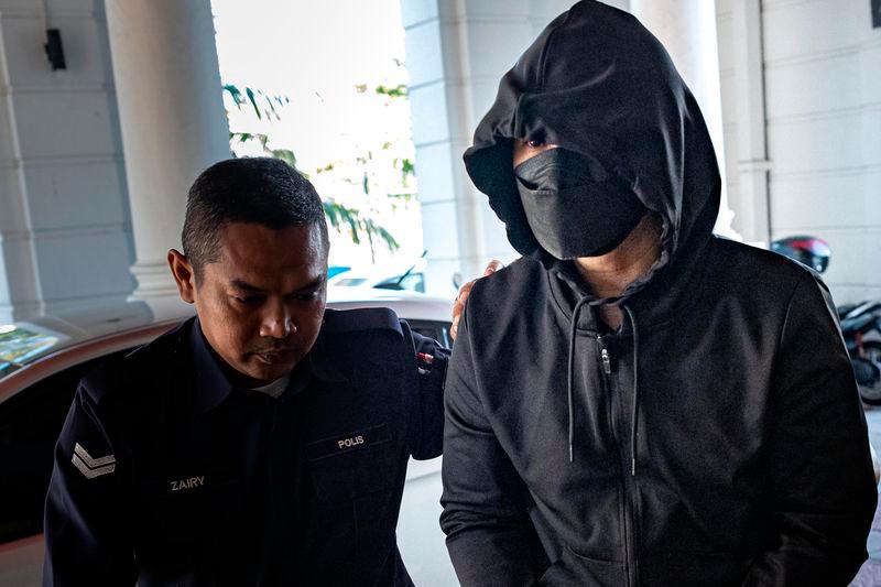 The accused, Mohd Nazri Abdul Razak (right) - BERNAMApix