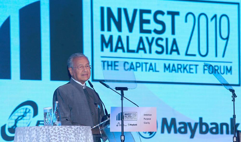 Mahathir delivering his keynote address at Invest Malaysia 2019 today. ZULKIFLI ERSAL/THESUN