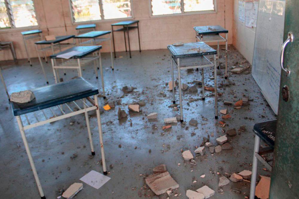 This handout photo taken and received on September 11, 2022 courtesy of WanNaiks Gallery shows damage at the Wawin National High School near the city of Lae following a 7.6-magnitude earthquake off Papua New Guinea’s coast. AFPPIX